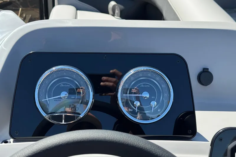 Slide: The Image of Dashboard of 2026 Barletta ARIA 22UC with dual gauges and steering wheel. - 39