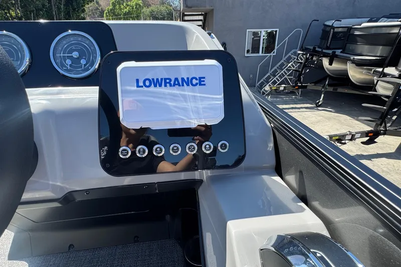 Slide: The Image of Control panel of 2026 Barletta ARIA 22UC boat with Lowrance display. - 40