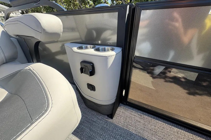 Slide: The Image of 2026 Barletta ARIA 22UC interior with cup holders and USB ports. - 48