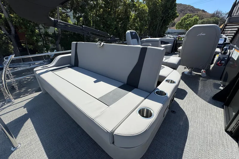 Slide: The Image of 2026 Barletta ARIA 22UC boat interior with gray seating and cup holders. - 55