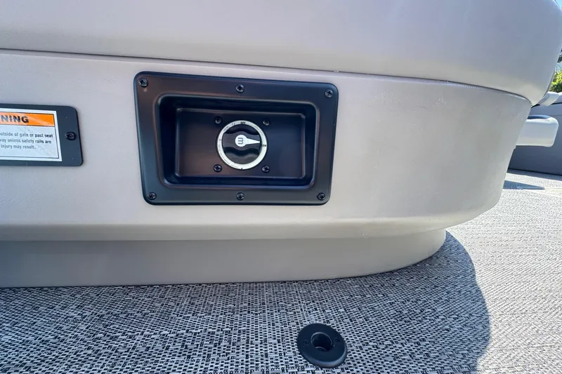 Slide: The Image of 2026 Barletta ARIA 22UC boat fuel cap and warning label on deck. - 61