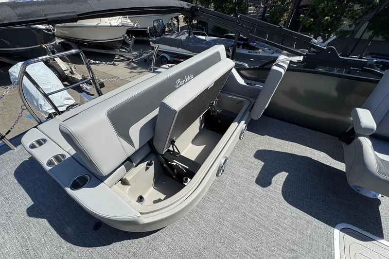 Slide: The Image of 2026 Barletta ARIA 22UC boat interior with adjustable seating and cup holders. - 63