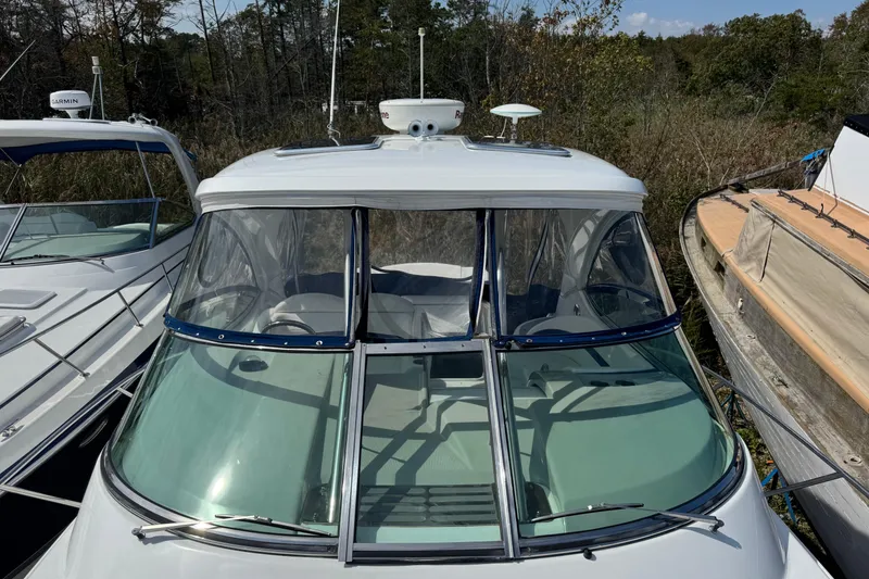 Slide: The Image of 2011 Formula 37 Performance Cruiser docked among other boats. - 12