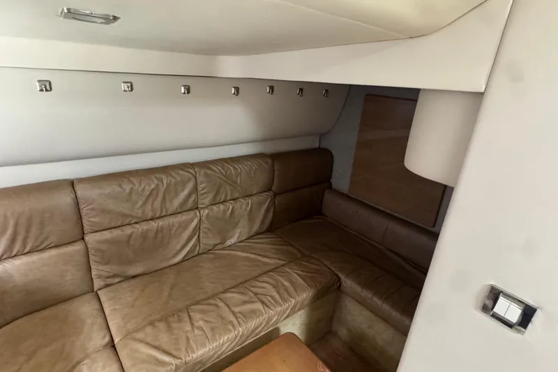 Slide: The Image of Interior of 2011 Formula 37 Performance Cruiser with brown leather seating. - 22