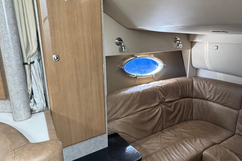 Slide: The Image of Interior of 2011 Formula 37 Performance Cruiser with leather seating and porthole window. - 25