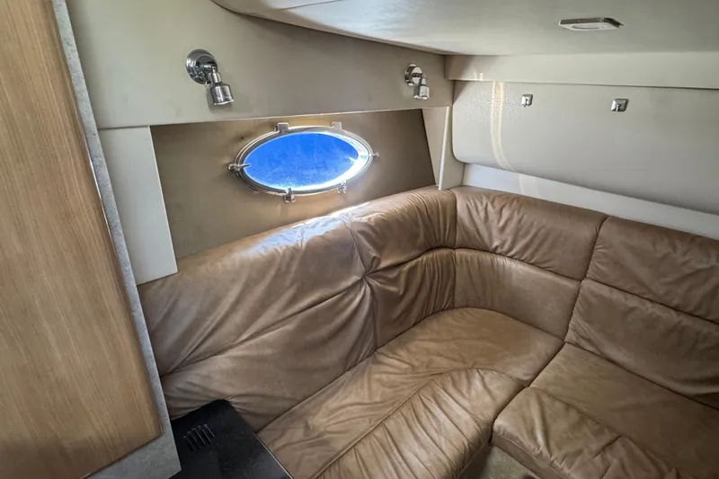 Slide: The Image of Interior of 2011 Formula 37 Performance Cruiser with leather seating and porthole window. - 43