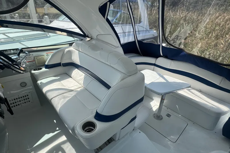 Slide: The Image of Interior of 2011 Formula 37 Performance Cruiser with white seating and table. - 46