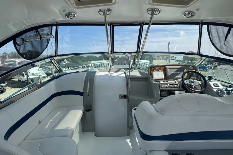 Slide: The Image of Interior of a 2011 Formula 37 Performance Cruiser, featuring helm and seating area. - 49