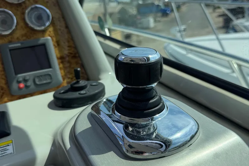 Slide: The Image of Joystick control on 2011 Formula 37 Performance Cruiser dashboard, with gauges and display. - 50