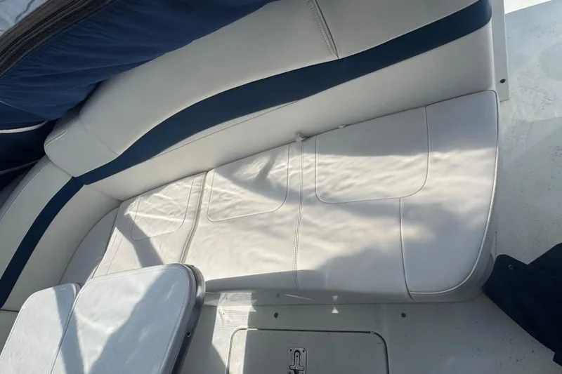 Slide: The Image of 2011 Formula 37 Performance Cruiser interior seating with white and blue upholstery. - 52