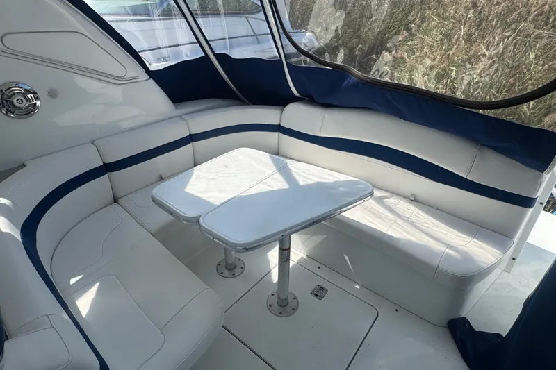 Slide: The Image of 2011 Formula 37 Performance Cruiser interior with white seating and table. - 53