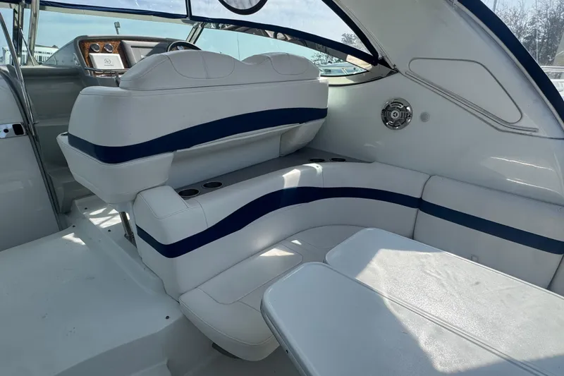 Slide: The Image of 2011 Formula 37 Performance Cruiser interior with white and blue seating. - 58