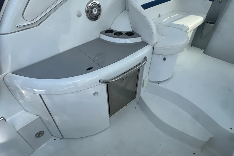 Slide: The Image of 2011 Formula 37 Performance Cruiser interior with seating and built-in storage. - 60