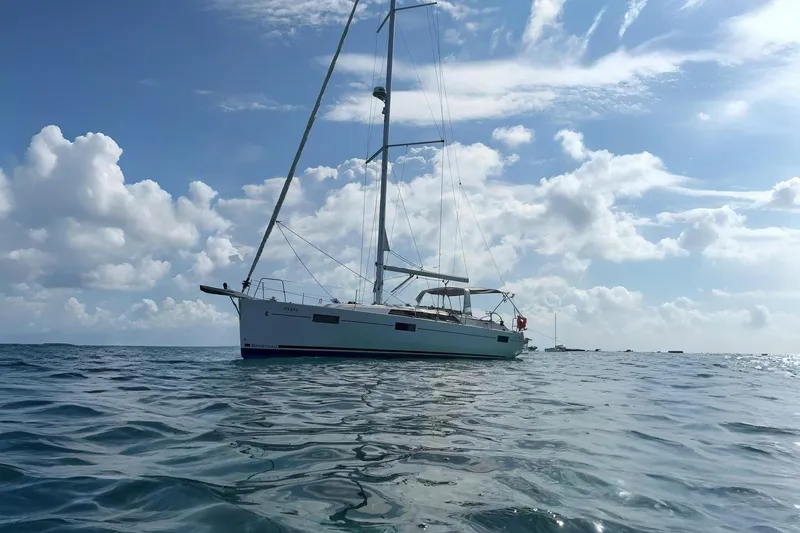 The Image of 2020 Beneteau Oceanis 41.1 sailboat on calm ocean under cloudy sky. - 1