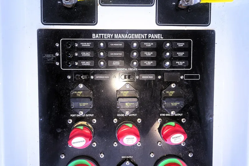 Slide: The Image of Battery management panel on 2004 Meridian 391 Sedan boat, featuring essential circuit controls. - 22