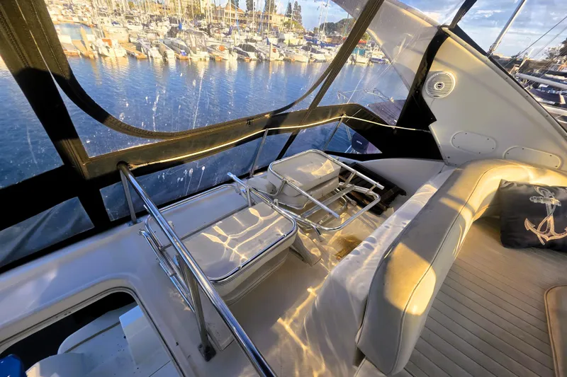 Slide: The Image of Luxurious 2004 Meridian 391 Sedan yacht interior with marina view. - 32