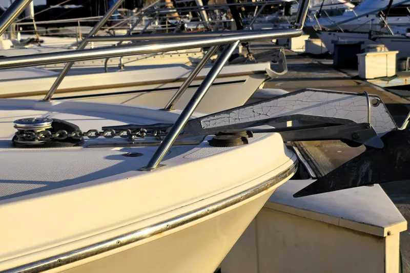 Slide: The Image of Close-up of a 2004 Meridian 391 Sedan yacht anchor and chain at a marina. - 33