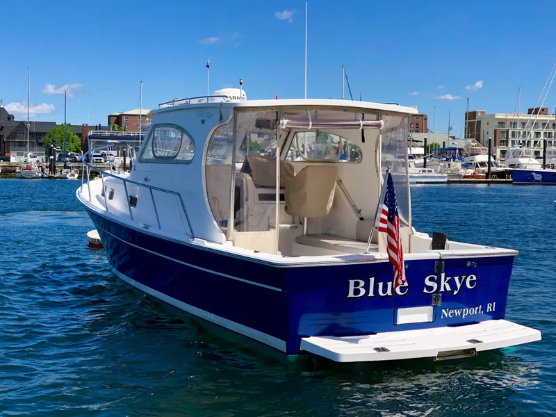 Slide: The Image of 2003 Mainship 30 Pilot II boat named "Blue Skye" docked in Newport, RI. - 7
