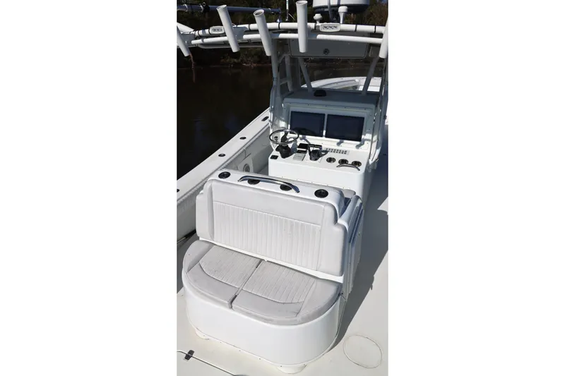 Slide: The Image of 2006 Yellowfin 36 Offshore boat interior with helm and seating area. - 17