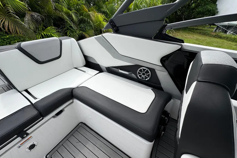 Slide: The Image of 2022 Yamaha Boats 252SE interior with sleek seating and modern design. - 10