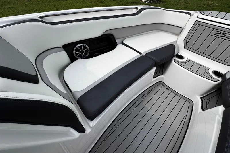Slide: The Image of 2022 Yamaha Boats 252SE interior with sleek seating and modern design. - 18