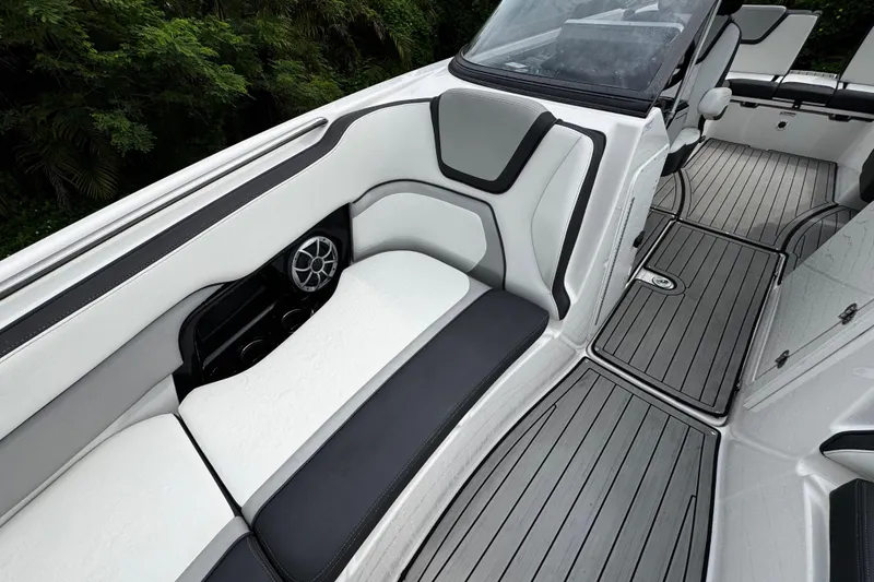 Slide: The Image of 2022 Yamaha Boats 252SE interior with sleek seating and modern design. - 20