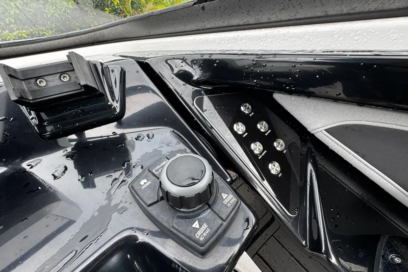 Slide: The Image of Control panel of 2022 Yamaha Boats 252SE, featuring sleek design and modern controls. - 23