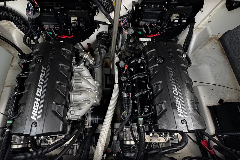 Slide: The Image of 2022 Yamaha Boats 252SE engine compartment with dual high-output engines. - 27