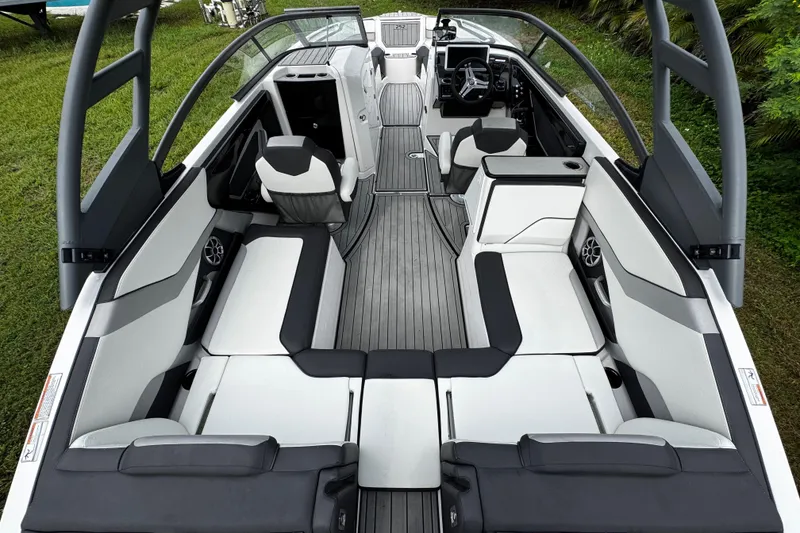 Slide: The Image of 2022 Yamaha Boats 252SE interior with sleek seating and modern design. - 30