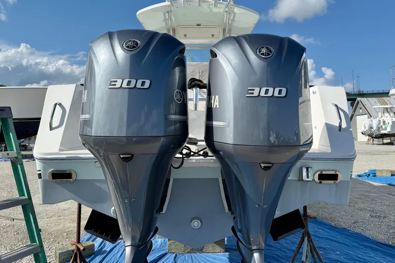Slide: The Image of 2006 Regulator 32 Forward Seating boat with twin Yamaha 300 engines. - 12