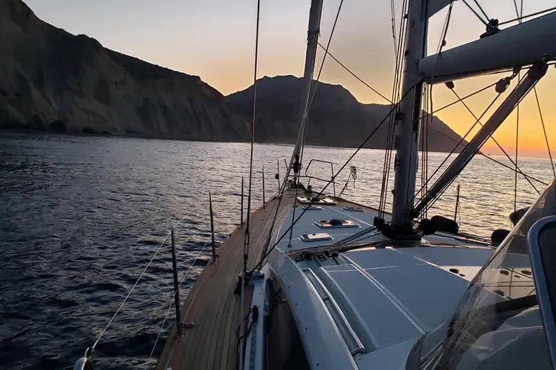 Slide: The Image of 2013 Jeanneau 57 yacht with sleek deck design and modern rigging. - 13