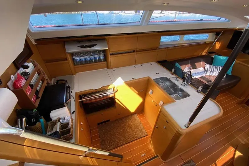 Slide: The Image of Control panel of a 2013 Jeanneau 57 yacht with navigation and thruster controls. - 20