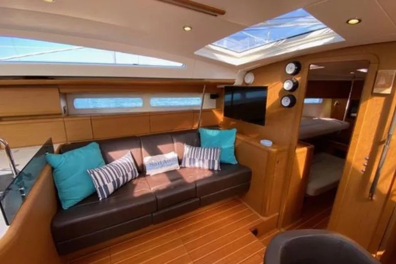 Slide: The Image of Interior view of 2013 Jeanneau 57 yacht showing open storage compartments. - 31
