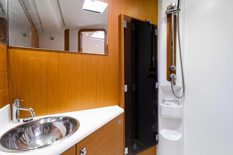 Slide: The Image of Luxurious interior of 2013 Jeanneau 57 yacht with elegant seating and modern design. - 36