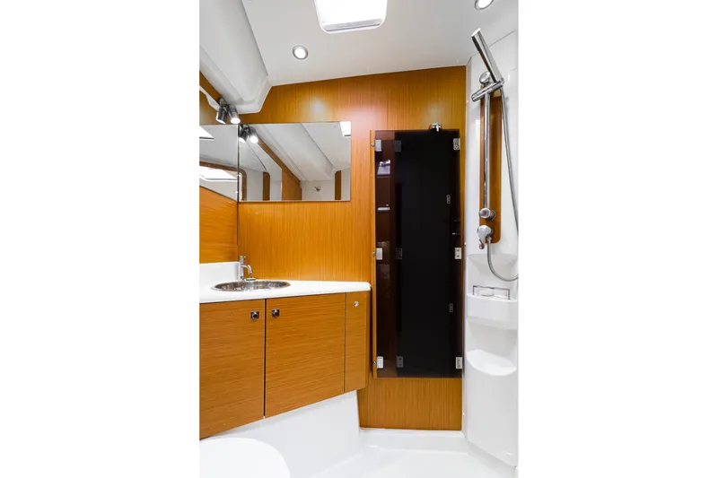 Slide: The Image of Luxurious interior of 2013 Jeanneau 57 yacht with leather seating and modern decor. - 37