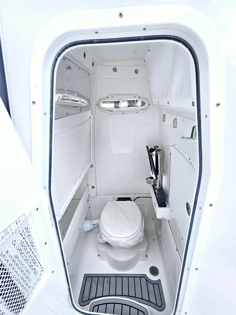 Slide: The Image of 2025 Sea Hunt Gamefish 27 FS boat interior bathroom with modern amenities. - 20