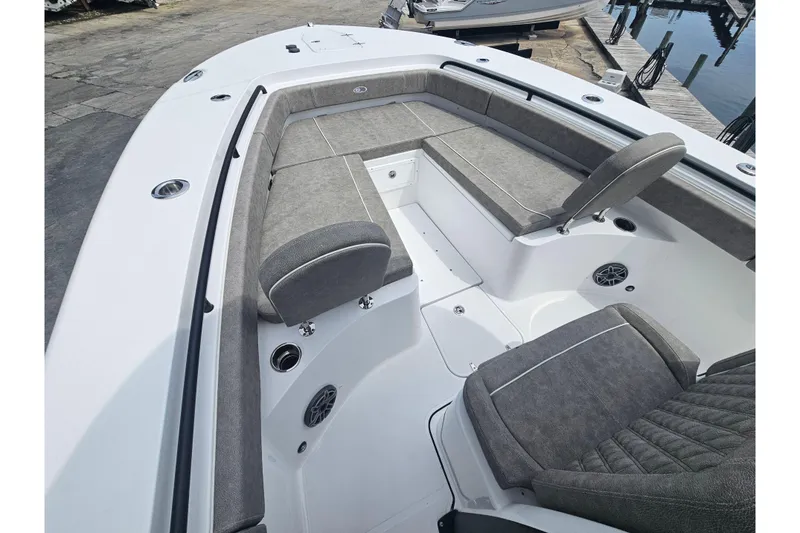 Slide: The Image of 2025 Sea Hunt Gamefish 27 Forward Seating with gray cushioned seats and spacious layout. - 30