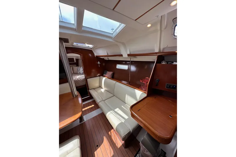 Slide: The Image of Interior of 2005 Beneteau Oceanis Clipper 373 yacht with wood finish and skylights. - 17