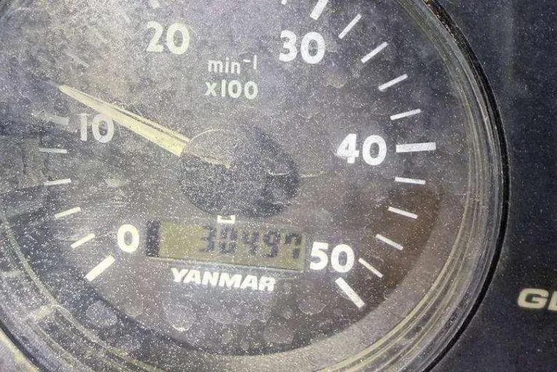 Slide: The Image of Yanmar tachometer displaying 3149.9 hours on a 2005 Beneteau Oceanis Clipper 373. - 31