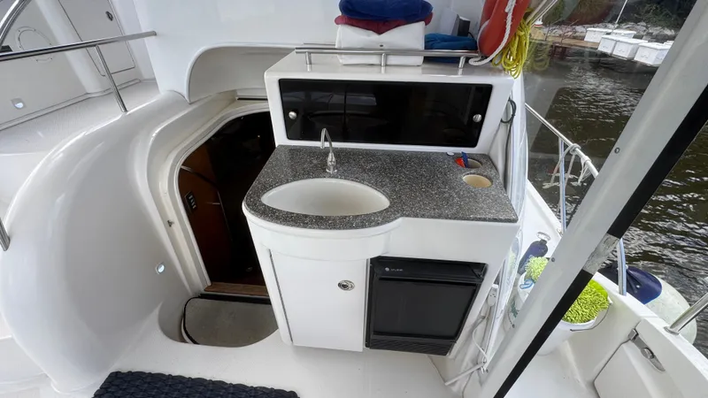 Slide: The Image of 2004 Meridian 459 Aft Sundeck Refreshment Station - 5