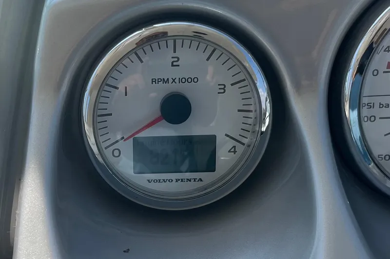 Slide: The Image of Tachometer of 2010 Monterey 400 Sport Yacht showing engine hours and RPM. - 13