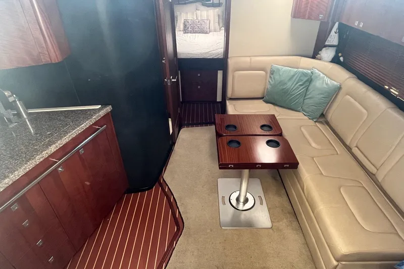 Slide: The Image of Luxurious interior of 2010 Monterey 400 Sport Yacht with leather seating and modern kitchen. - 20
