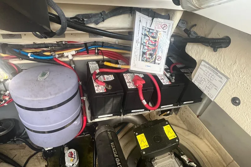 Slide: The Image of Engine compartment of 2010 Monterey 400 Sport Yacht with batteries and wiring. - 36