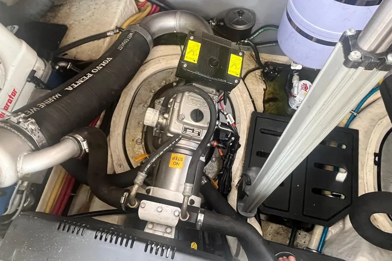 Slide: The Image of Engine compartment of a 2010 Monterey 400 Sport Yacht, featuring Volvo Penta components. - 37