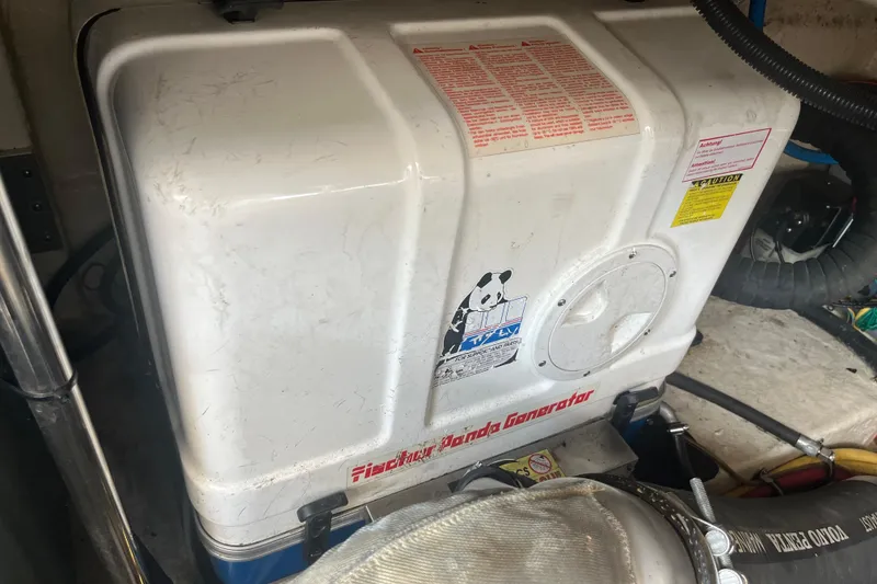 Slide: The Image of Fischer Panda generator in a 2010 Monterey 400 Sport Yacht engine room. - 39