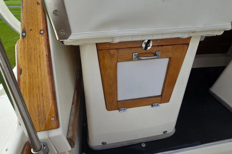 Slide: The Image of 1989 Hinterhoeller Limestone boat interior with wooden and white panel details. - 18