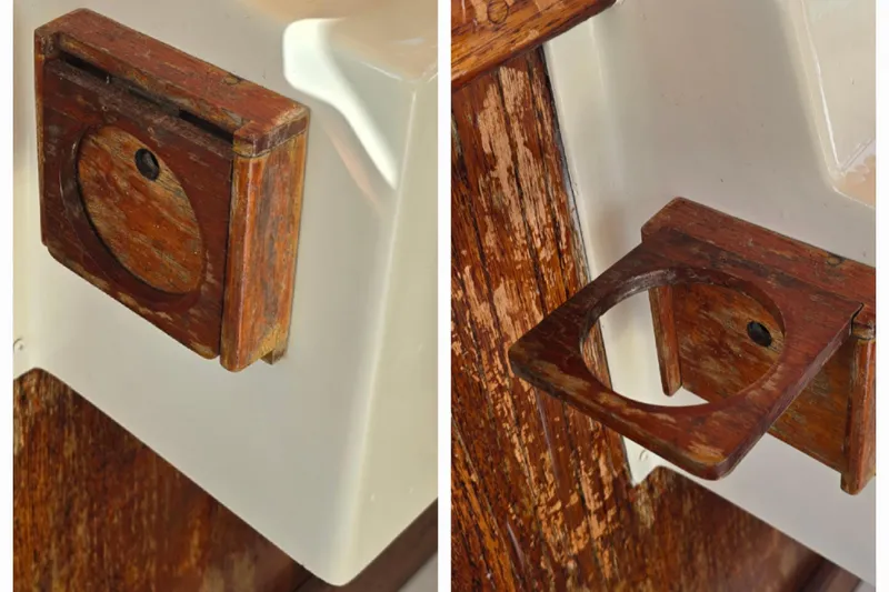 Slide: The Image of 1989 Hinterhoeller Limestone boat with a vintage wooden cup holder detail. - 25