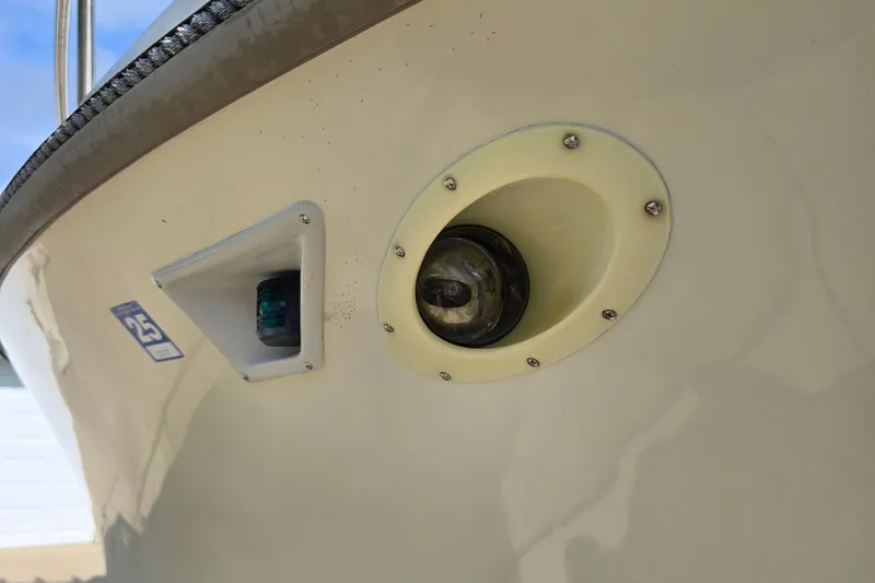 Slide: The Image of 1989 Hinterhoeller Limestone boat detail showing navigation light and hull design. - 4