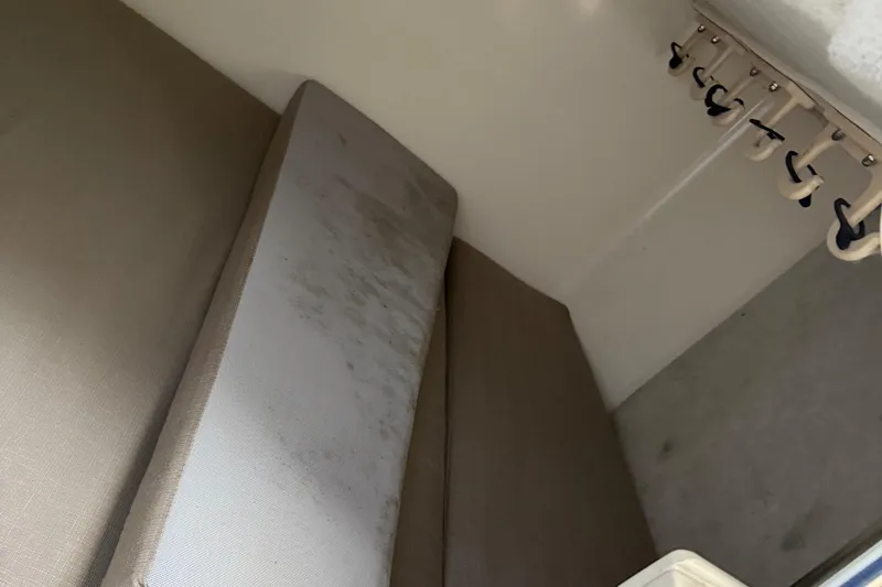 Slide: The Image of Interior cabin of 1996 Grady-White Marlin 300 boat with seating and rod holders. - 17