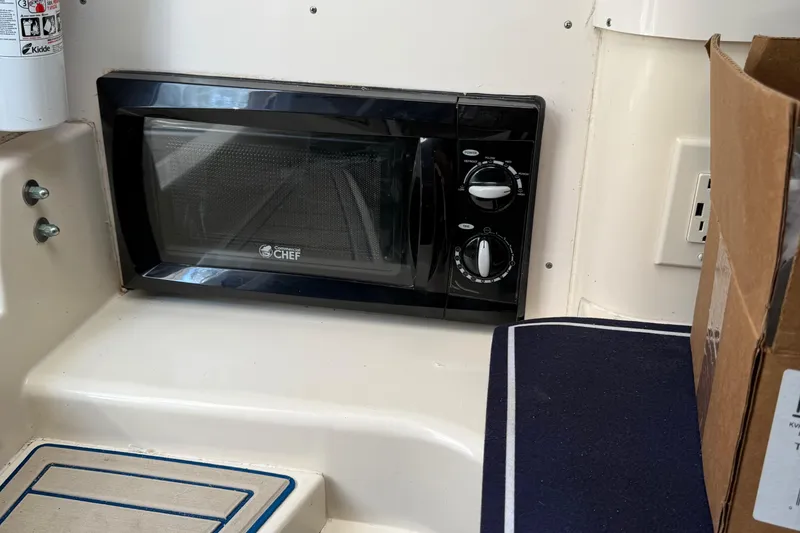 Slide: The Image of Microwave in 1996 Grady-White Marlin 300 boat interior. - 21